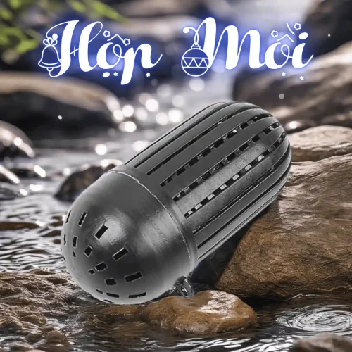 Hộp đựng mồi tỏa hương chậm màu đen, hình viên thuốc, đặt trên phiến đá ở suối, chuyên dùng cho bẫy cá, tôm, cua.
